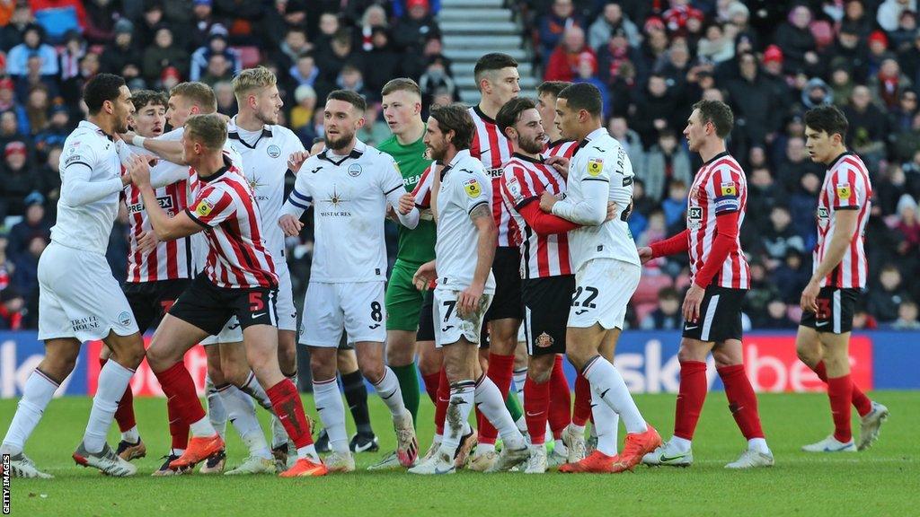 Players from both sides clashed after Luke O'Nien made a challenge on Ollie Cooper