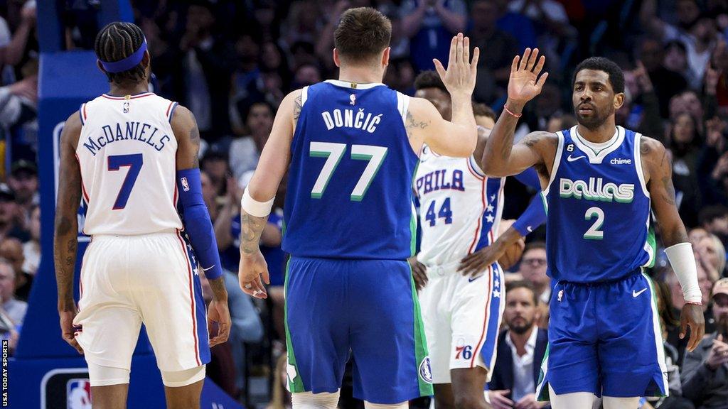 Luka Doncic congratulates Kyrie Irving