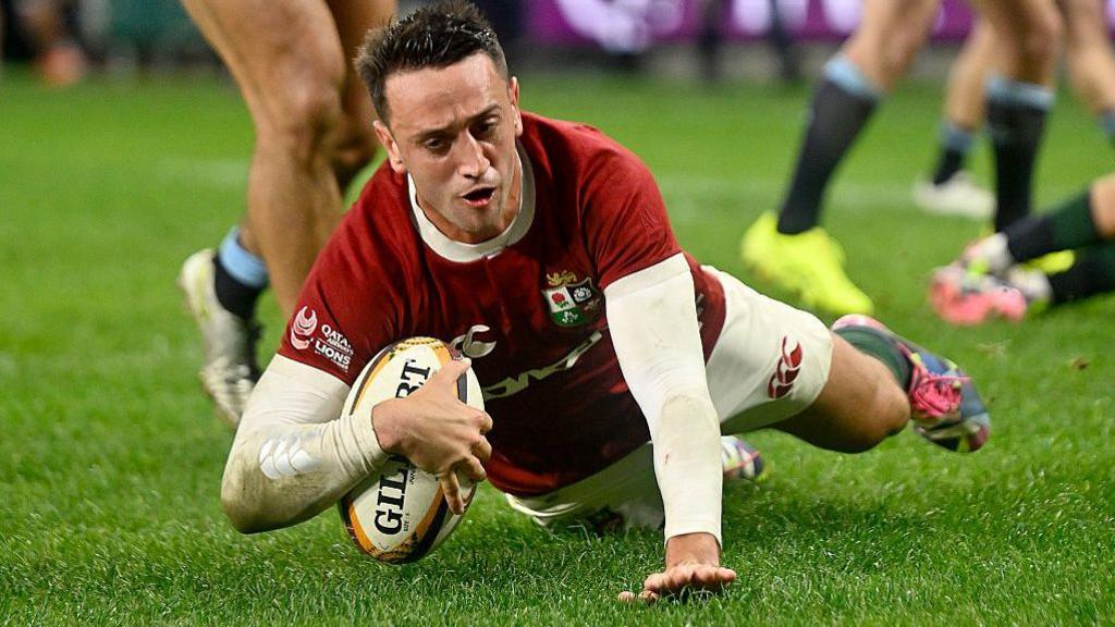 Alex Mitchell dives to score the British and Irish Lions' third try during the tour match against NSW Waratahs