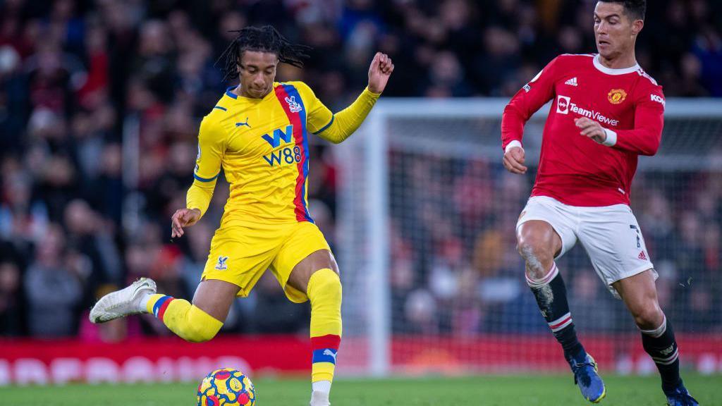Crystal Palace's Michael Olise and Manchester United's Cristiano Ronaldo