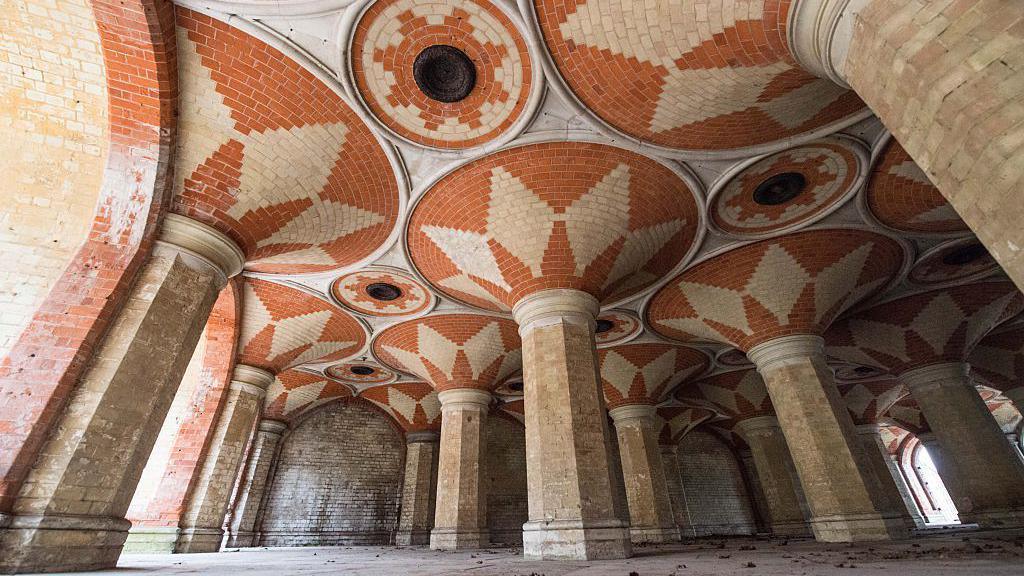 Pedestrian Subway, Vestibule, Terrace and Stairs beneath Crystal Palace Parade, Byzantine-style vaulting in red and cream brick and chequered floors in alternating stone. The structure dates from 1865 and was built to link a new train station directly to the entrance of the Crystal Palace. Designed by highly-accomplished architect Charles Barry Junior.