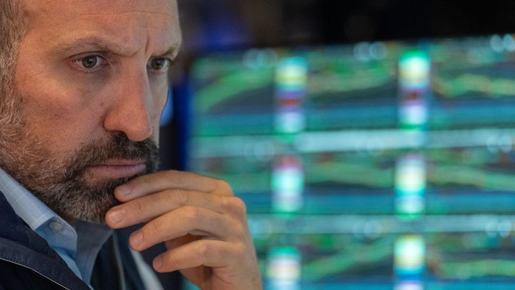  A trader works on the floor of the New York Stock Exchange (NYSE) on August 1, 2024 in New York City.