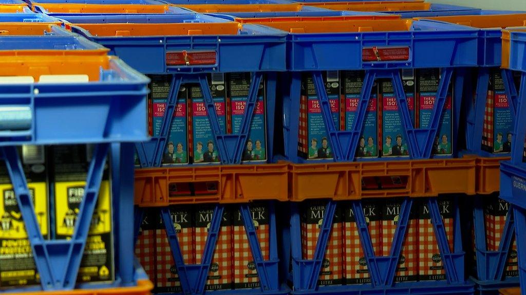 Guernsey Dairy milk crates containing cartons