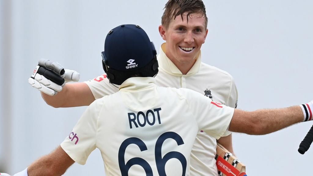 England batters Joe Root and Zak Crawley embrace