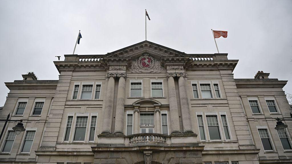 County Hall in Maidstone, Kent. It is a large stone building in a neoclassical style  and bears Kent County Council's insignia - a prancing horse in a red shield.