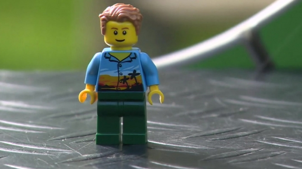 Mini Lego toy in a Hawaiian shirt