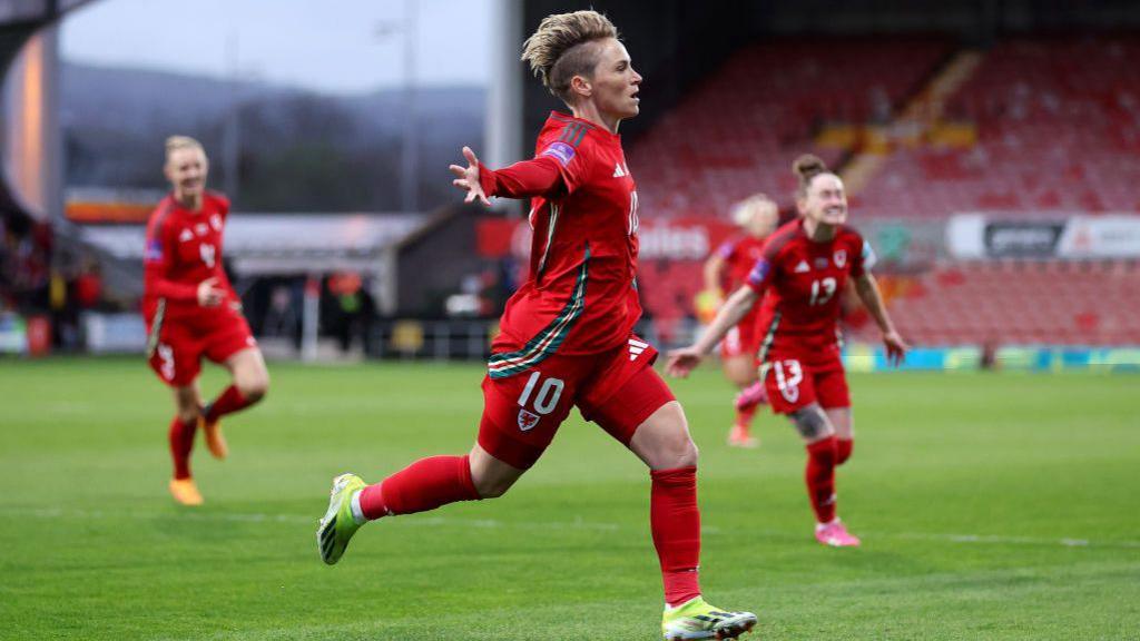 Jessica Fishlock of Wales celebrates scoring her team's first goal 