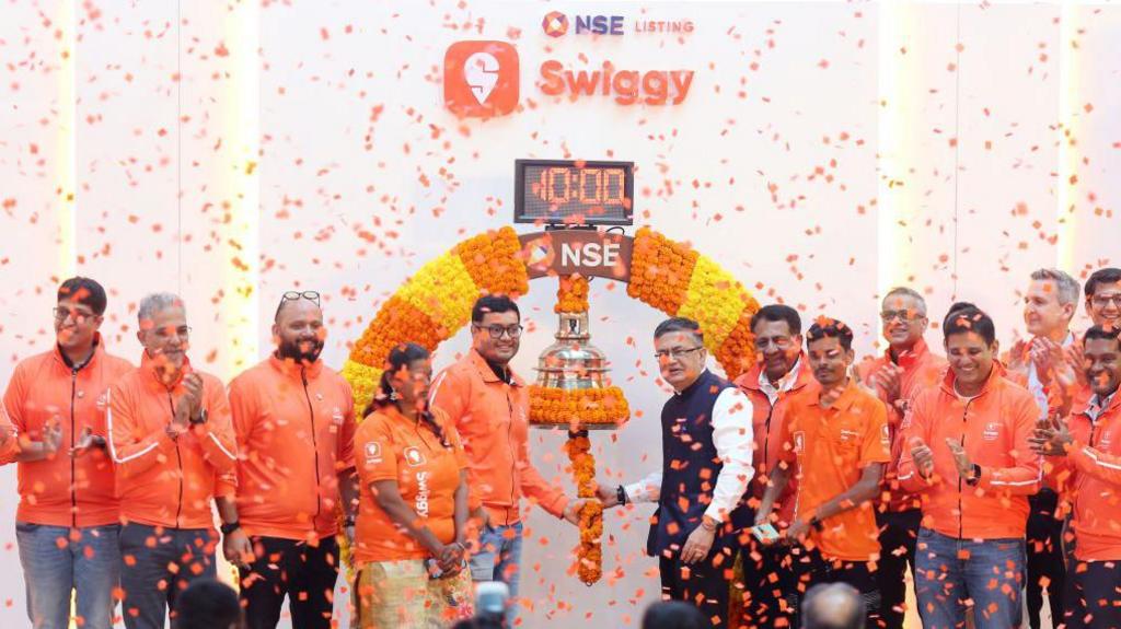 Confetti falls during the listing ceremony for Swiggy - a food delivery startup - at the National Stock Exchange in November 2024.