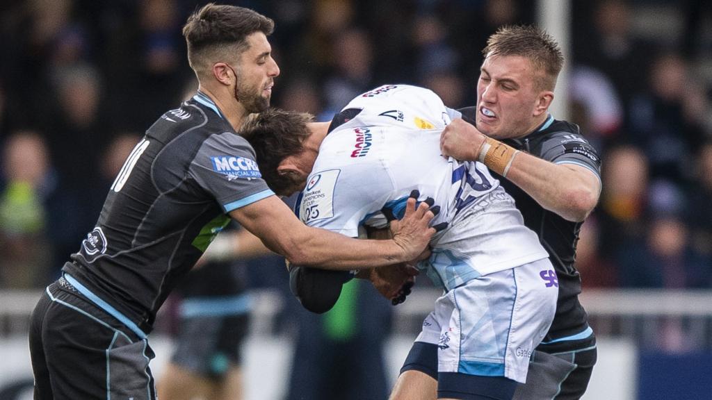 Glasgow Warriors' Adam Hastings and Matt Fagerson tackle Sale's AJ MacGinty