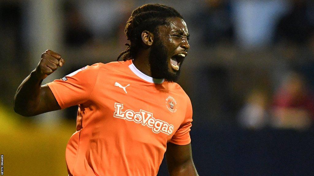 Kylian Kouassi celebrates his goal for Blackpool against Barrow in the EFL Trophy