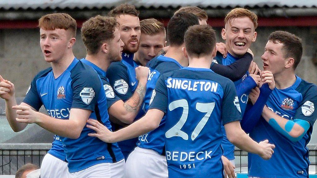 Glenavon players celebrate victory over Crusaders