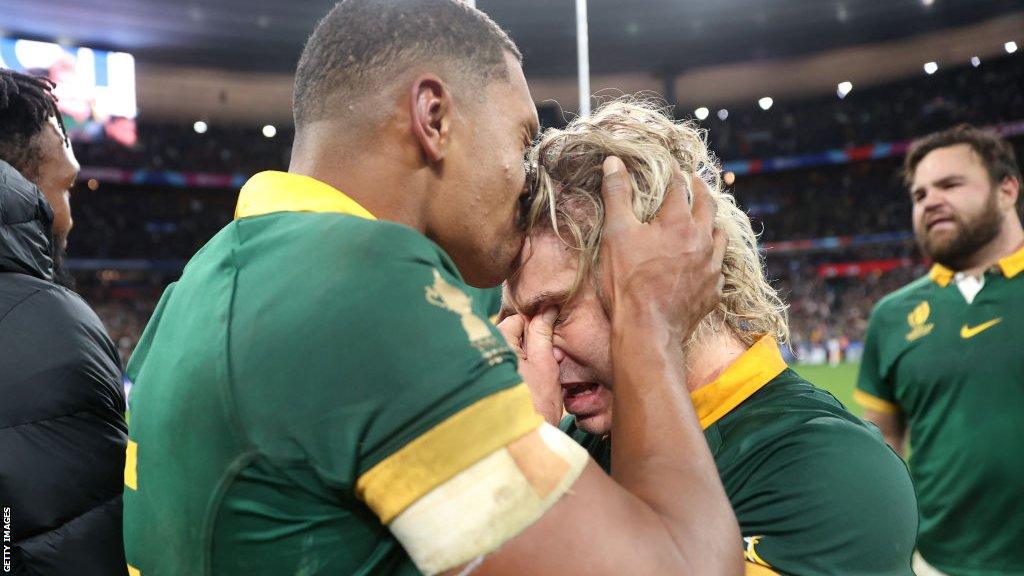 Scrum-half Faf de Klerk tearfully celebrates with South Africa team-mate Damian Willemse