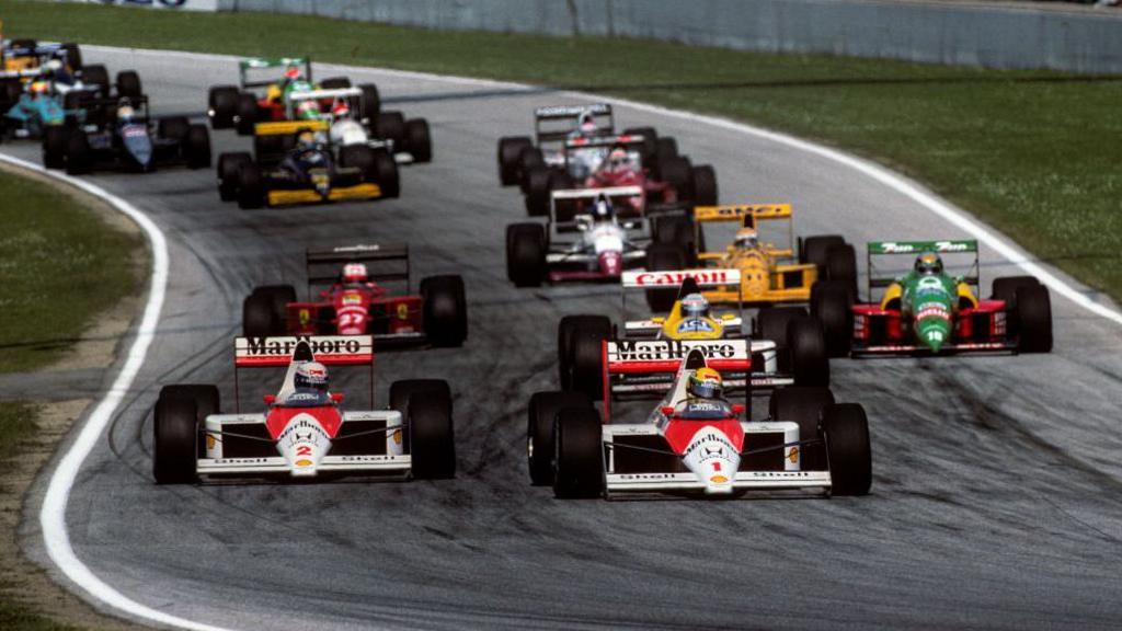 Ayrton Senna and Alain Prost lead the field at the San Marino Grand Prix in 1989 