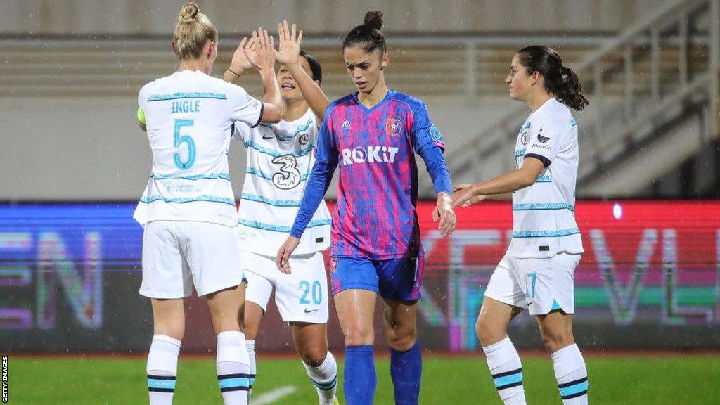 Sophie Ingle celebrates the opening goal with her team-mates