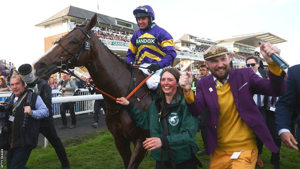 Derek Fox on Corach Rambler celebrates after winning the Grand National