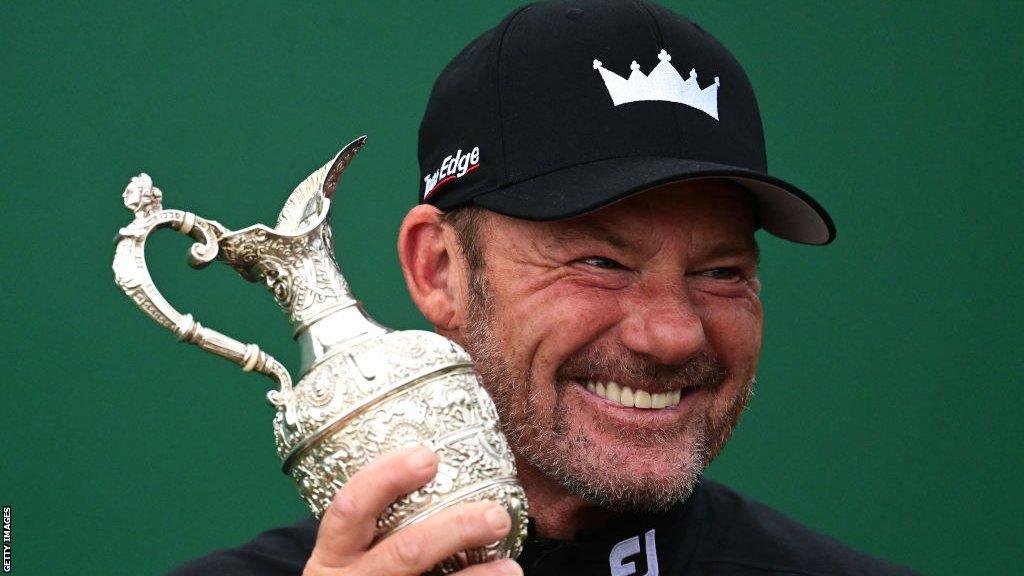 Alex Cejka poses with the Senior Open trophy