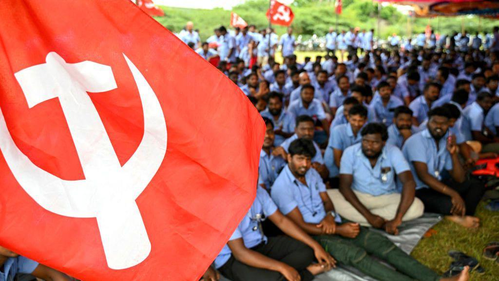 Workers stage a protest to demand higher wages and recognition of their union, at Samsung India's plant in Sriperumbudur, near Chennai on September 11, 2024. Samsung Electronics workers in southern India went on strike from September 9 to demand better pay and working hours, with the consumer tech giant promising the industrial action would not impact consumers. (Photo by R.Satish BABU / AFP) (Photo by R.SATISH BABU/AFP via Getty Images)