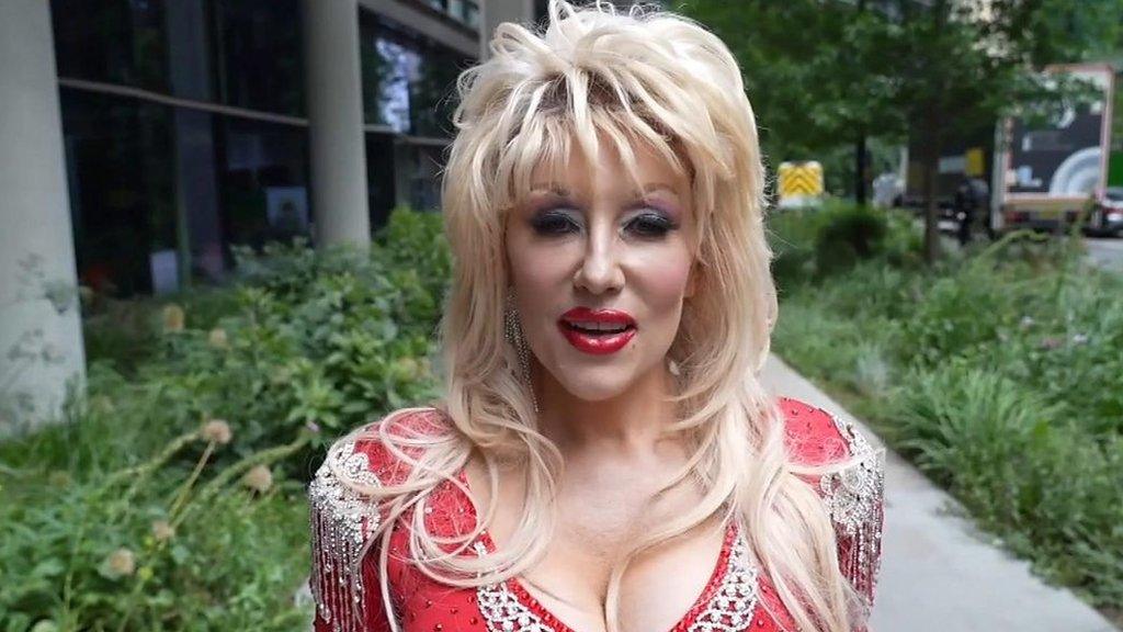 Dolly Parton impersonator outside Meta's London HQ