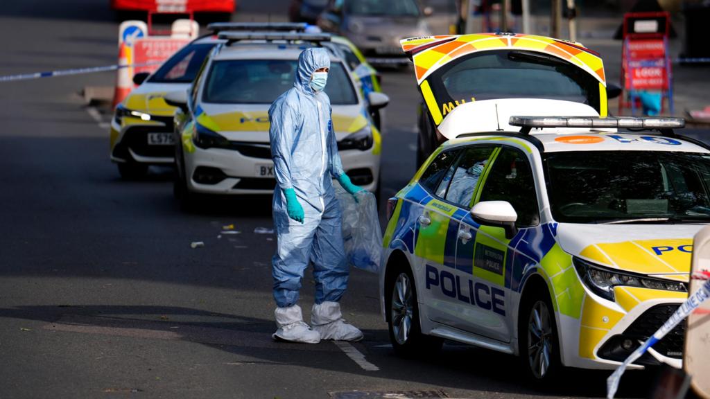  A forensics officer at the scene in Golders Green