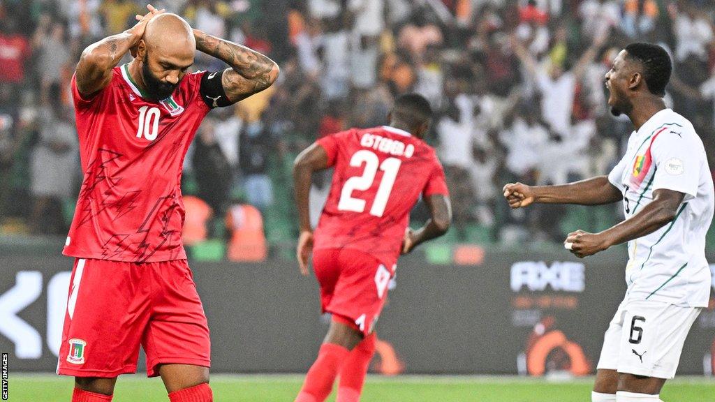 Equatorial Guinea striker Emilio Nsue reacts after missing a penalty against Guinea a the 2023 Africa Cup of Nations