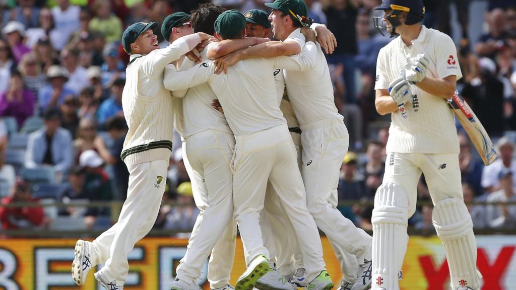 Australia celebrate the final wicket of Chris Woakes