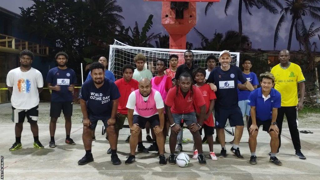 Justin Walley (fourth from right) with players on the Marshall Islands