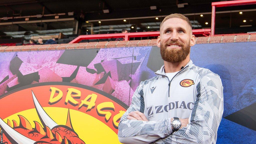 Catalans Dragons' Sam Tomkins watches on at Old Trafford