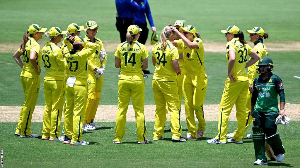 Australia women's cricket team celebrate a wicket against Pakistan