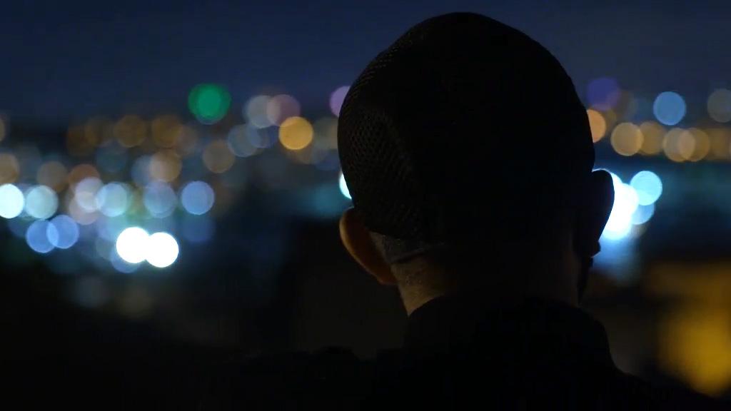 Silhouetted headshot of a man