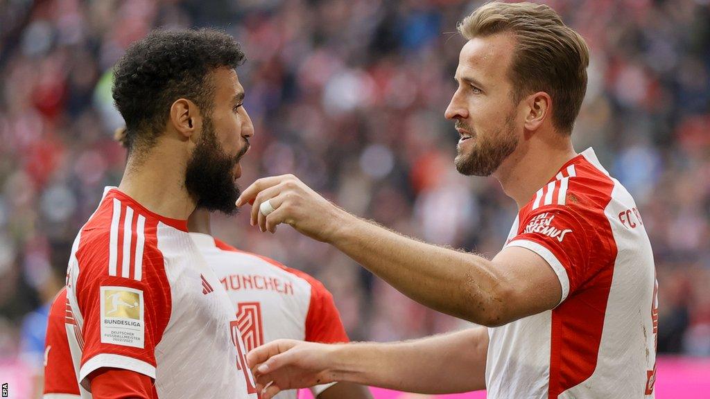 Harry Kane celebrates after scoring for Bayern Munich