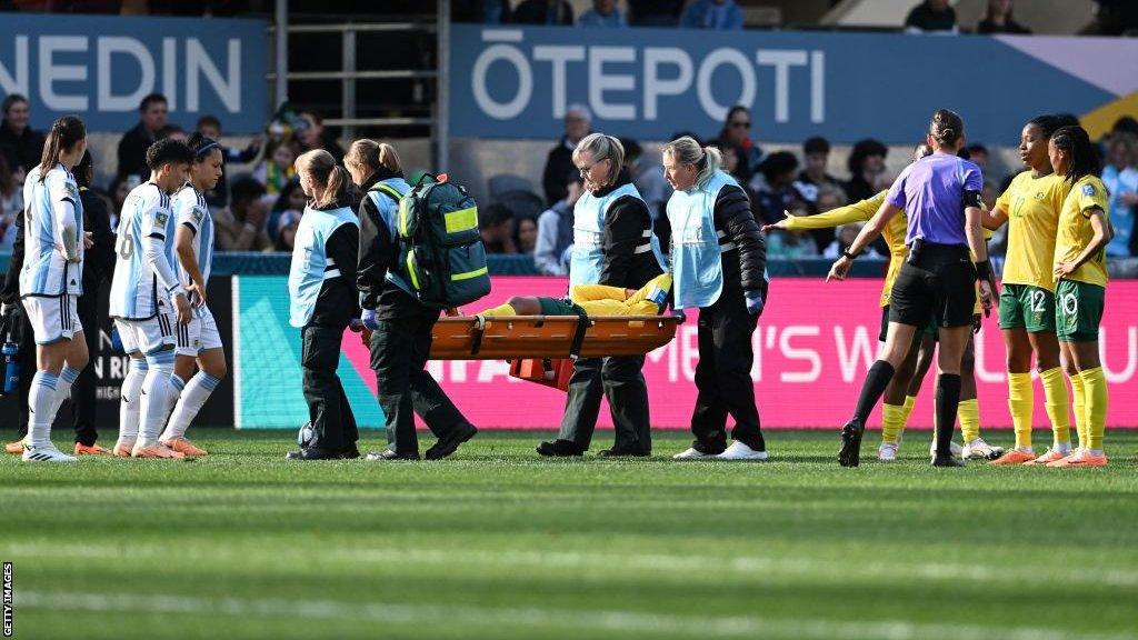 Refiloe Jane is taken off on a stretcher