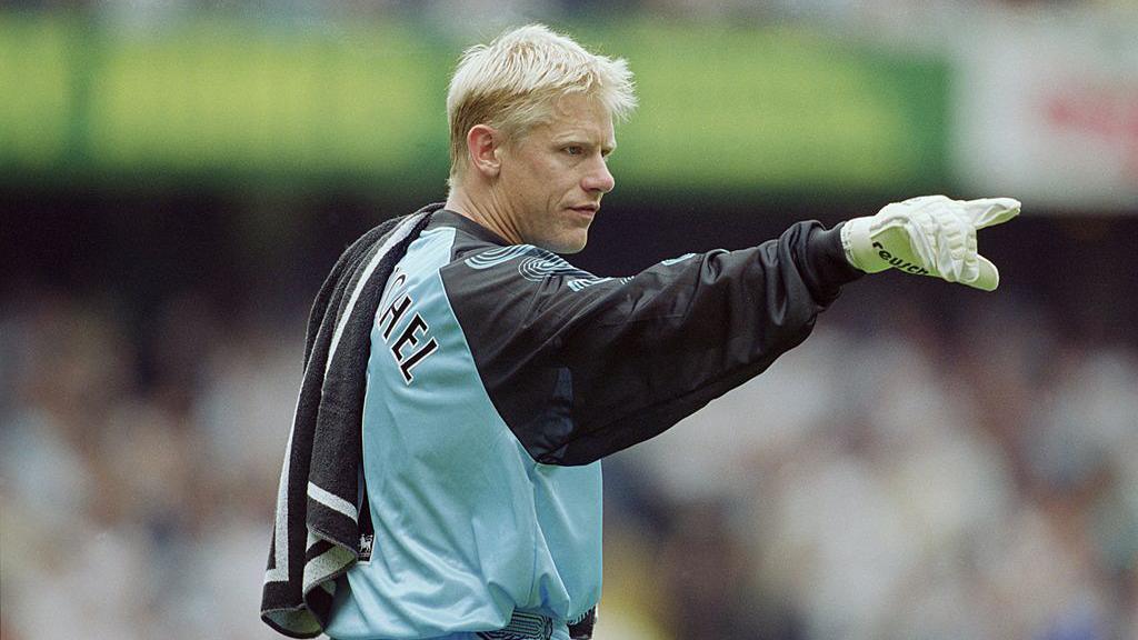 Aston Villa's Peter Schmeichel points
