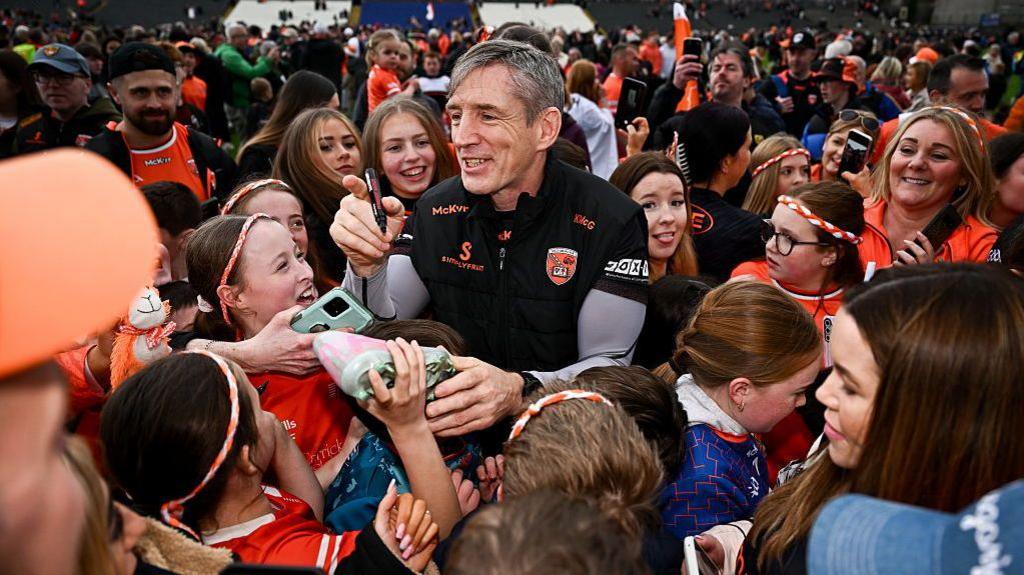 Kieran McGeeney mobbed at full-time
