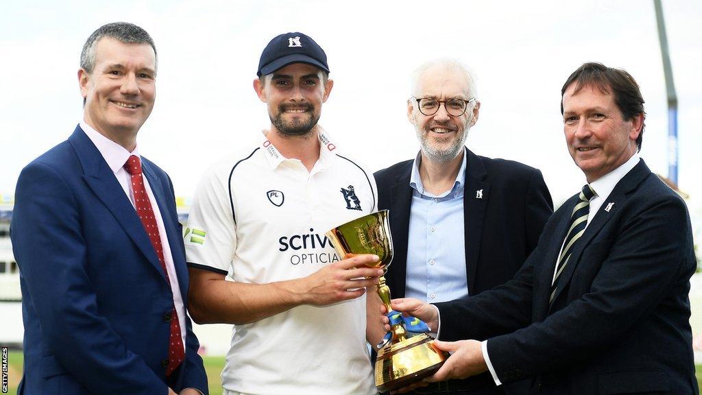 Ian Watmore, Warwickshire captain Will Rhodes,Warwickshire CEO Stuart Cain and Warwickshire chairman Mark McCafferty with the County Championship trophy