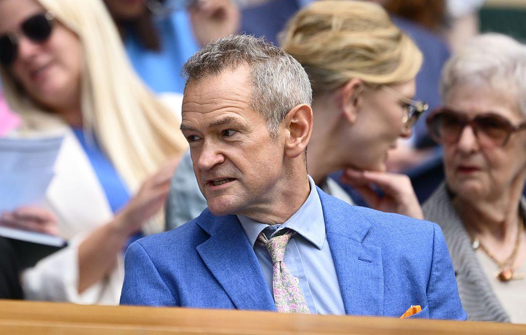Alexander Armstrong watches on from the Wimbledon Centre Court royal box