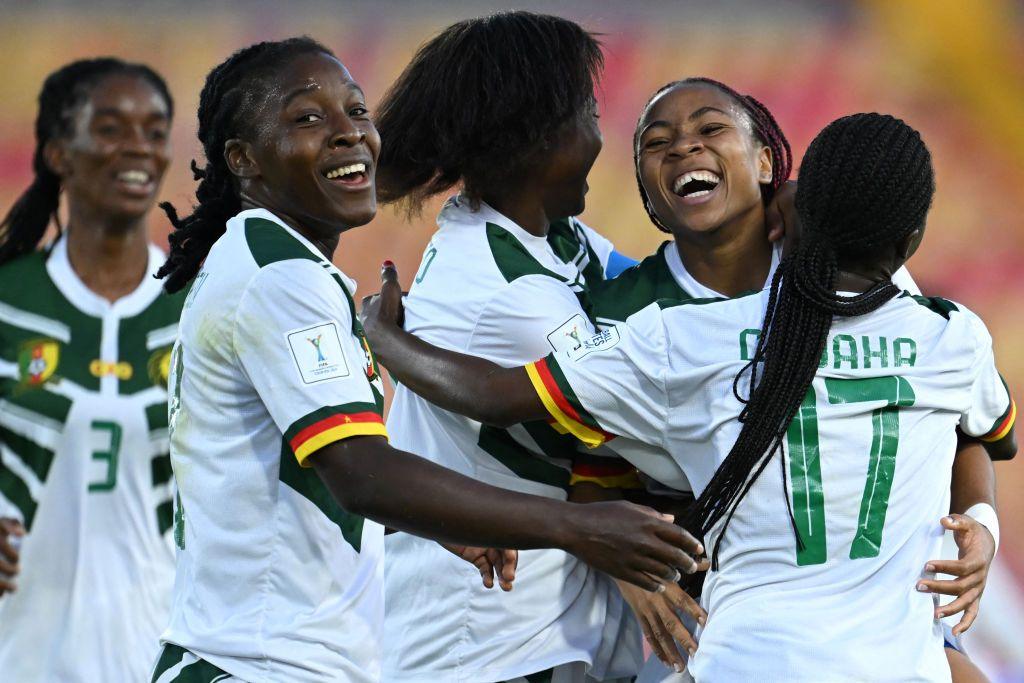 Cameroon's midfielder Achta Toko Njoya (second from right) celebrates with teammates after scoring during the 2024 FIFA U20 Women's World Cup match between Australia and Cameroon in Bogota.