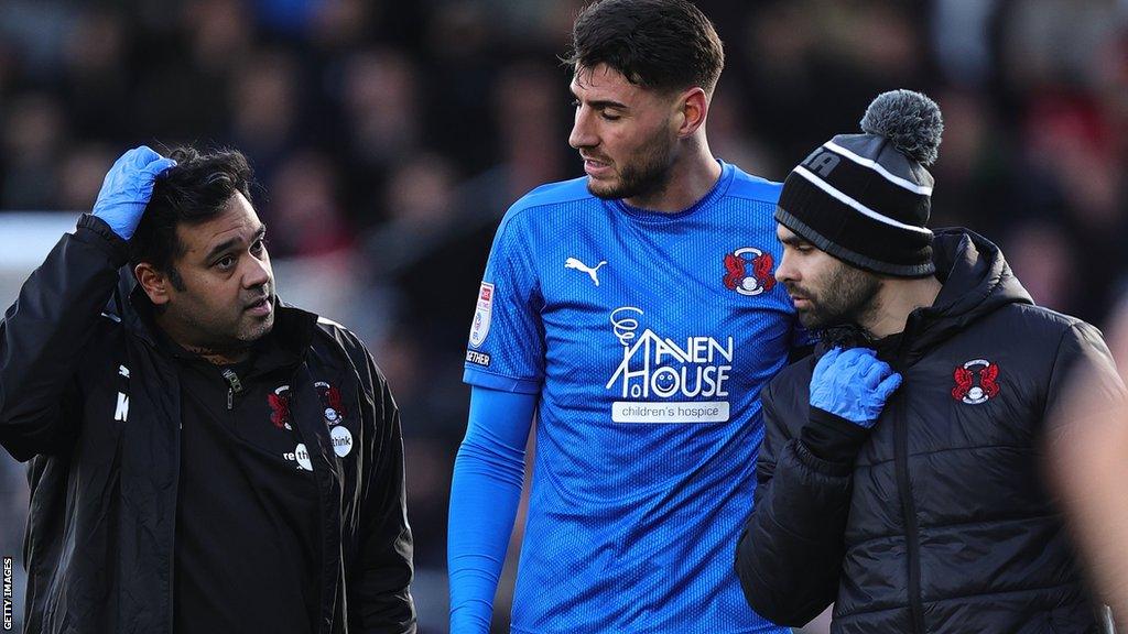 Dan Happe (centre) with members of Leyton Orient's medical team