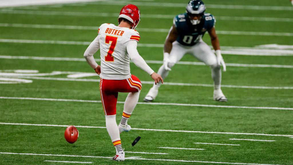 Kansas City Chiefs' Harrison Butker taking an onside kick