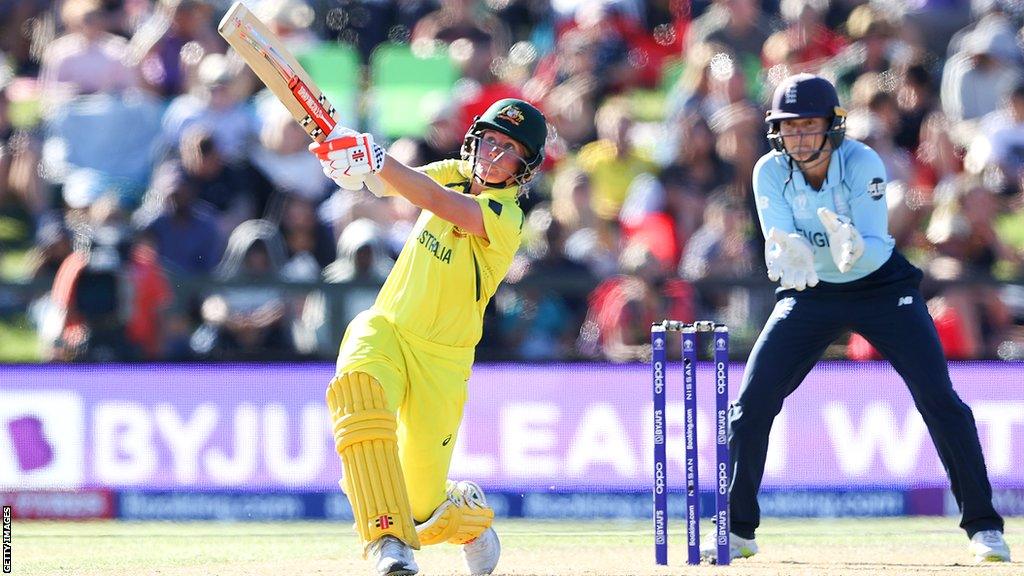 Australia's Beth Mooney plays a shot during the 2022 Cricket World Cup final against England