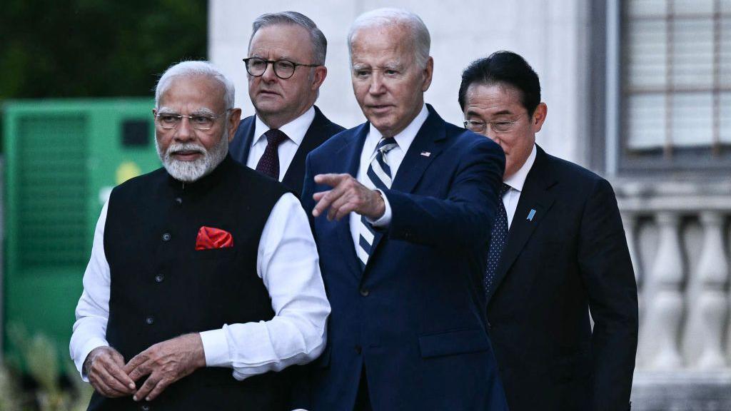 US President Joe Biden (3R), alongside Indian Prime Minister Narendra Modi, Australian Prime Minister Anthony Albanese and Japanese Prime Minister Fumio Kishida, arrives to speak about a Quadrilateral Cancer Moonshot announcement during the Quadrilateral Summit at the Archmere Academy in Wilmington, Delaware, on September 21, 2024. (Photo by Brendan SMIALOWSKI / AFP) (Photo by BRENDAN SMIALOWSKI/AFP via Getty Images)
