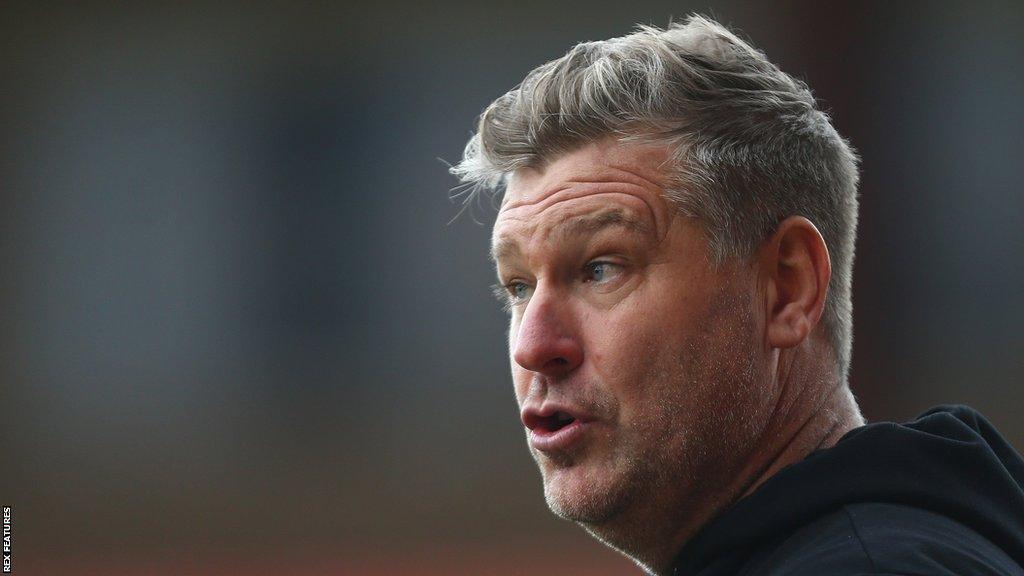 Karl Robinson on the touchline for Salford City