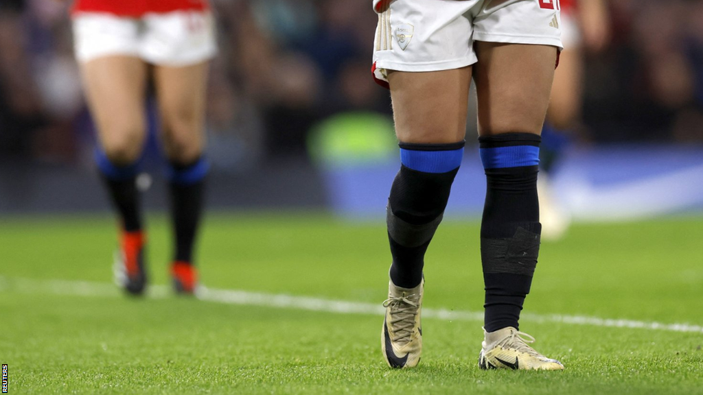 Arsenal players in Chelsea socks