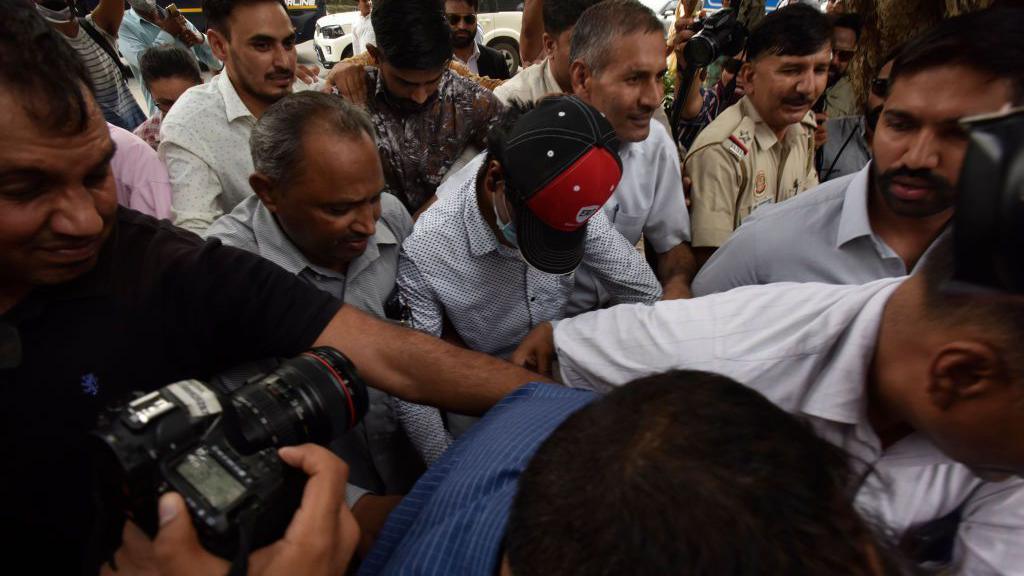 Alt News co-founder Mohammed Zubair being produced at Patiala House Court by Delhi Police in a case related to an allegedly objectionable tweet he had posted in 2018, near India Gate, on June 28, 2022 in New Delhi, India. Mohammed Zubair of Alt News was arrested on Monday in a case related to a tweet he had posted in 2018 against a Hindu deity. (Photo by Salman Ali/Hindustan Times via Getty Images)