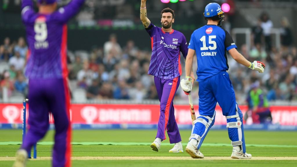 Reece Topley celebrates the wicket of Zak Crawley