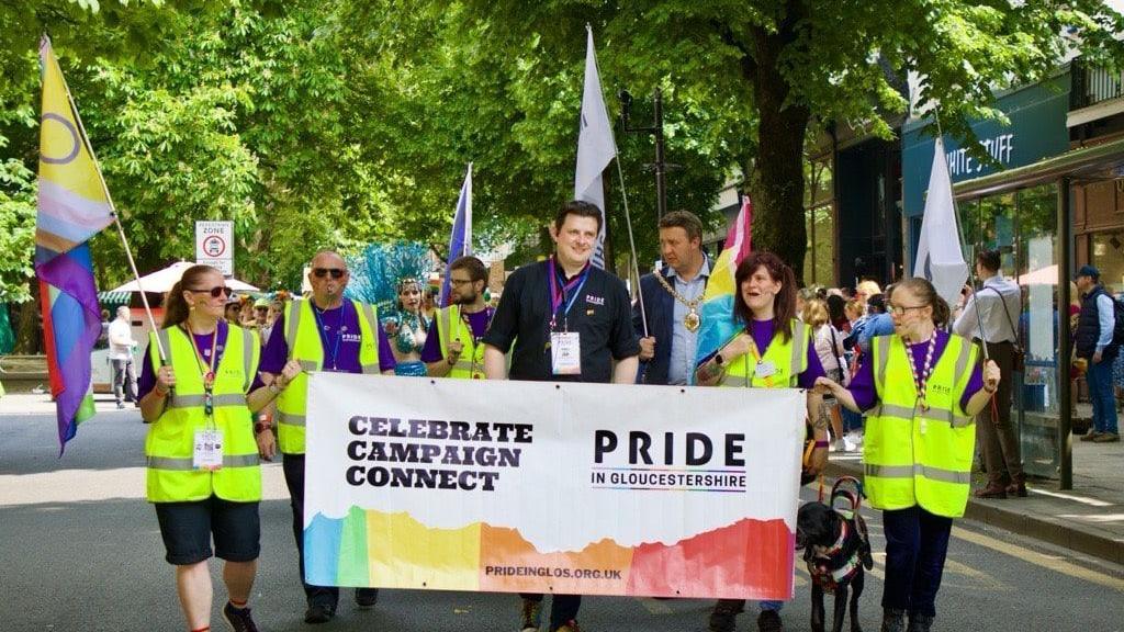 People taking part in the Cheltenham pride march