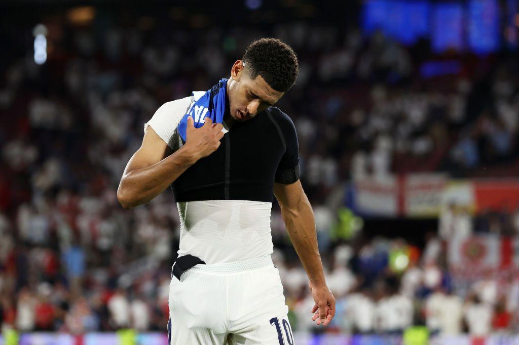Jude Bellingham of England reacts as he leaves the field, whilst wearing a shoulder support.