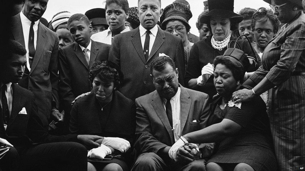 The family of Carol Robertson, a 14-year-old African American girl killed in a church bombing, attend graveside services for her, Sept. 17, 1963, Birmingham, Ala.