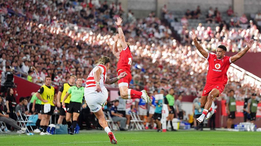 Halatoa Vailea of Japan kicks the ball during the rugby international between Japan and Wales