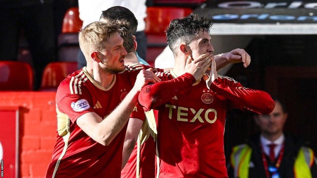 Aberdeen's Jamie McGrath celebrates with Richard Jensen as he scores to make it 2-1 to the Dons