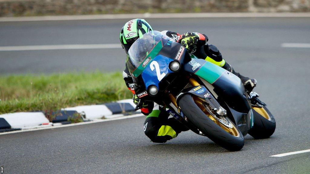 Andrea Majola racing around the course at the Junior Manx GP